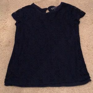 A blue short sleeve shirt